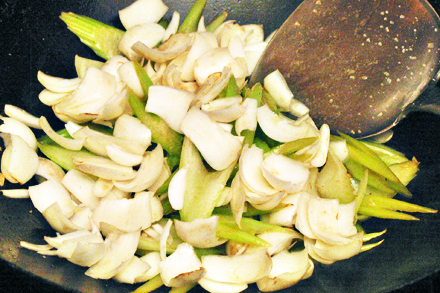 Stir-fry Lily Bulbs and Celery in a Wok